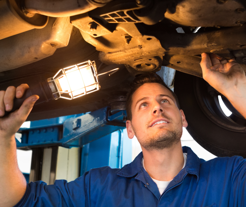 Mechanic inspecting a vehicle - MOT, Servicing & Tyres Swanage